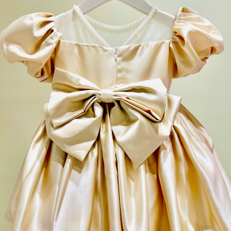 Elegant Champagne Satin Dress with Puffy Sleeves and Pearl Embellishments
